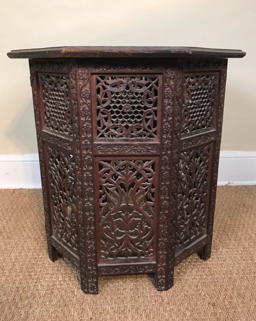 An Indian Carved Hardwood Octagonal Table. Bombay Circa 1900 .
