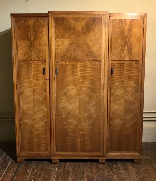 A Heals Walnut and Ripple Maple Compactum Wardrobe Circa 1925