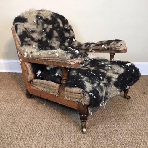A Holland and Sons Walnut Open Armchair Circa 1870 for Recovering.