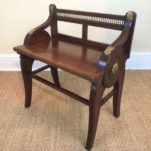 An Aesthetic Movement Walnut and Brass Mounted Hall Stool by Jas Shoolbred  C 1880