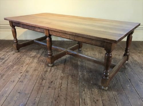 A Large Arts and Crafts Oak Six Leg Table C 1910 from the Great Hall of Christ Church College Oxford.