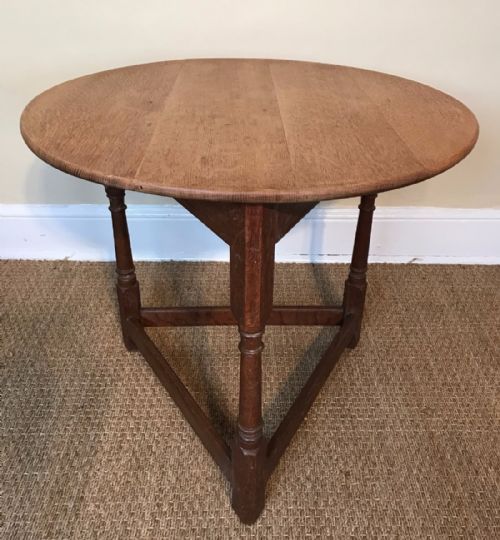 An Arts and Crafts Oak Cricket Table Circa 1910 in the Style of Heals .