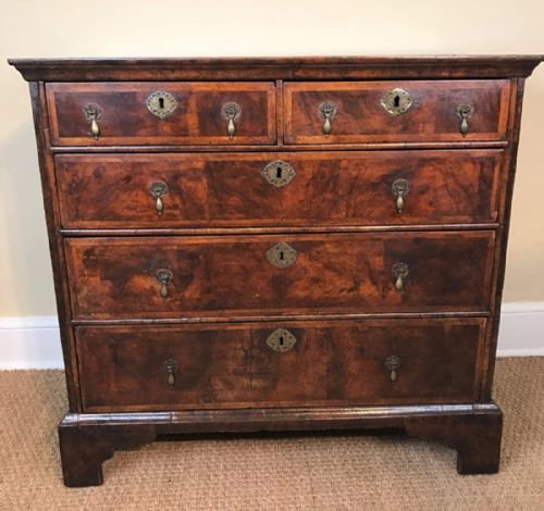 A George 1 Walnut and Feather Banded  Chest of Drawers Circa 1710