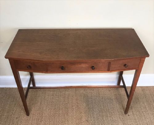 An English Arts and Crafts Walnut Side Table Circa 1930.