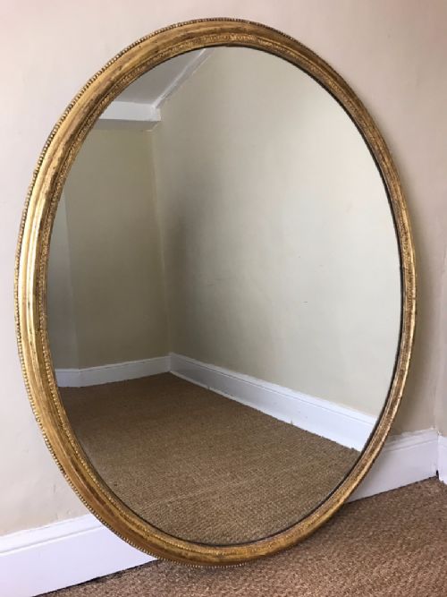 A Large Mid Victorian Gilt Oval Mirror Circa 1860