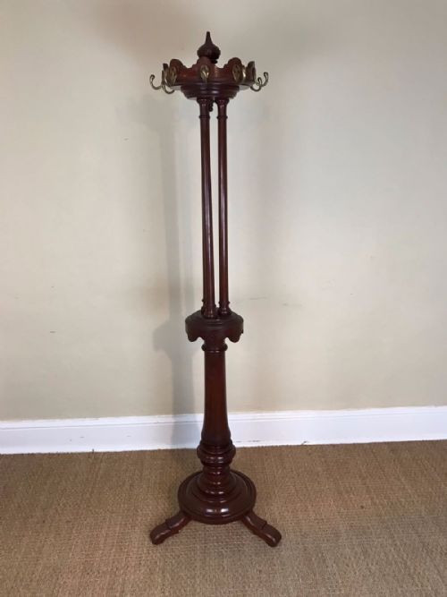 A Victorian Mahogany Revolving Hat and Coat Stand Circa 1870.