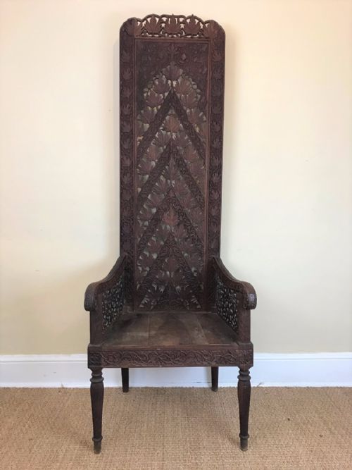 An Extraordinary Indian Carved Teak Throne Chair Bombay Presidency Circa 1880.