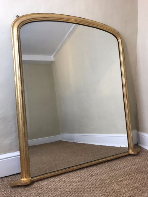 A Victorian Arched Gilt Over Mantel Mirror Circa 1860