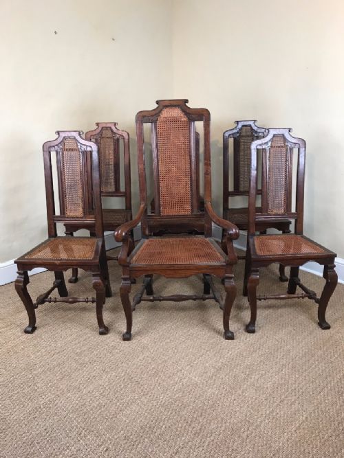 A Rare Set of 7 James II Oak and Caned Dining Chairs Circa 1685