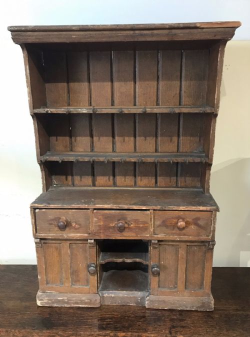 A Late 19th Century West Country Miniature Pine Dresser with the Original Scumbled Finish.