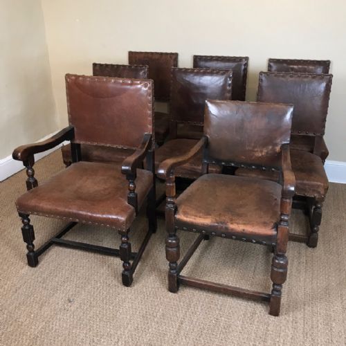 A Matched Set of Eight Liberty's Oak and Leather Dining Chairs Circa 1910