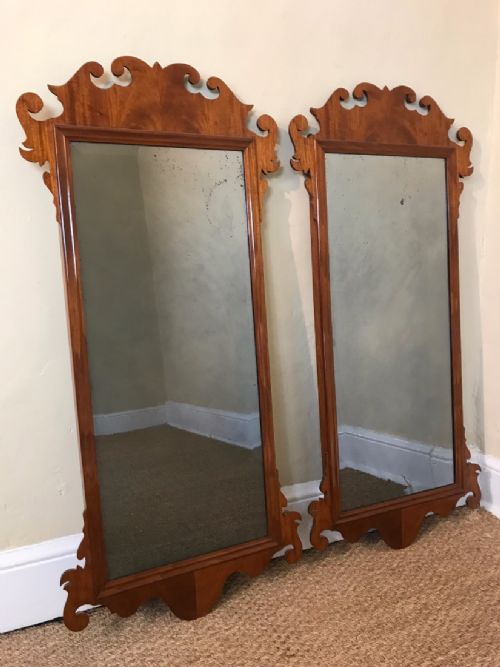 A Pair of Late 19th C Walnut Pier Mirrors in George 11 Style with 18th C Adam Period Hand Silvered Bevelled Mirror Plates .