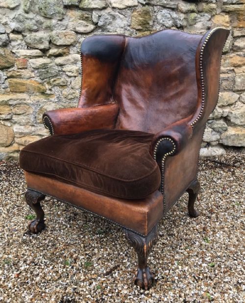 An Edwardian Mahogany and Leather Wing Armchair Circa 1910