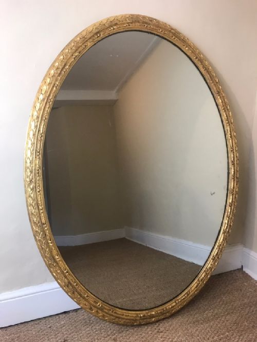 A Large English Water Gilt Oval Mirror C 1850