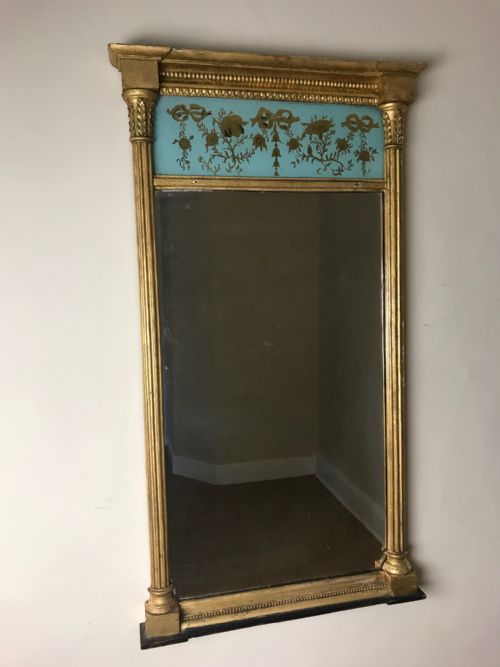 A Small Regency Eglomise and Gilt Pier Mirror Circa 1820.