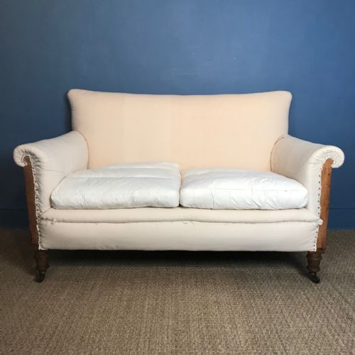 A Victorian Walnut Two Seater Sofa Circa 1890 in Good Solid Condition Covered in Calico with Two Feather Seat Cushions.

size : 55 Inches Wide 33 Inches Deep 34 Inches High
a Victorian Walnut Two Seater Sofa Circa 1890