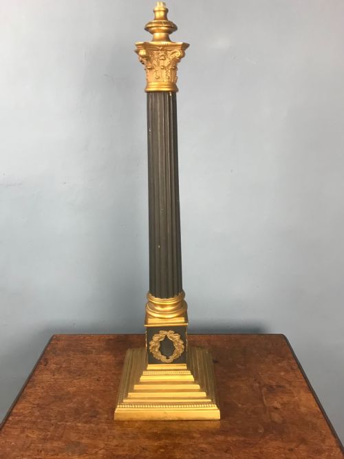 A Large Mid 19th Century Corinthian Column Lamp Circa 1860.
