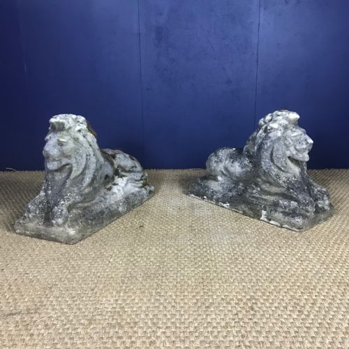 A Pair of Composite Stone Seated Lions Circa 1920