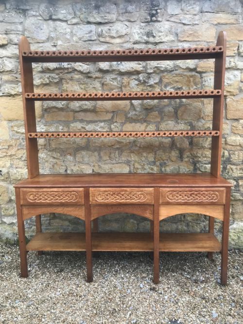 An Arts and Crafts Oak Dresser in Celtic Style Circa 1930
