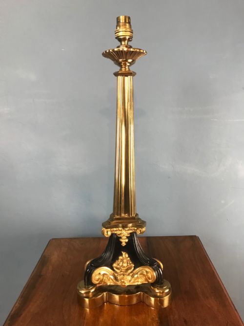 A George IV Gilt Brass and Ebonised Lamp Circa 1830 by Messenger of London .