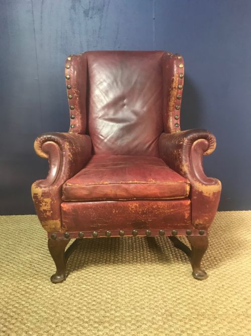 A Large Late Victorian Red Leather Wing Armchair Circa 1900