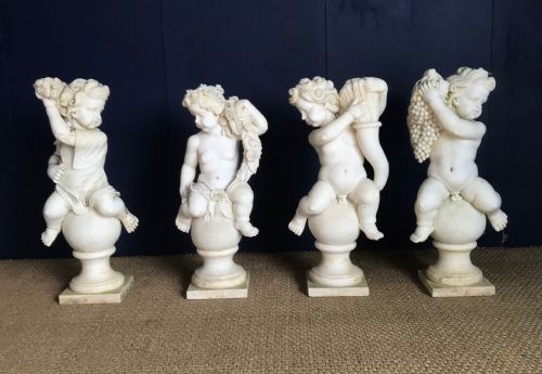A Set of 4 Italian Marble Statues of the Four Seasons Circa 1930 .