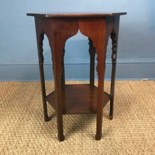 A Liberty and Co Mahogany Hexagonal Table Circa 1890 in the Moorish Taste .