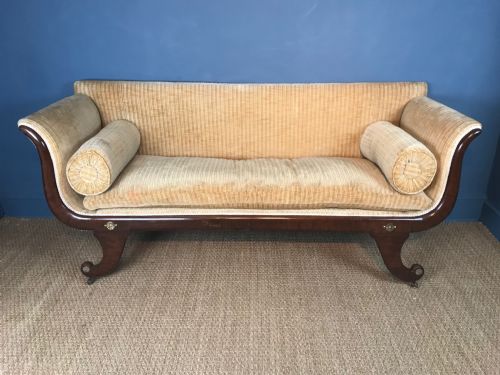 A George IV Mahogany Sofa Circa 1825 with Scrolled Arms on Sabre Legs with Brass Capped Roundels
