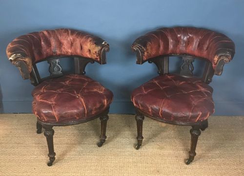 A Pair of Overscale Victorian Oak and Leather Library Chairs Circa 1890