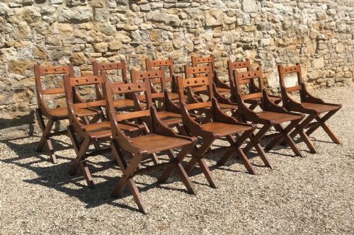 A Set of 12 Gothic Revival Oregon Pine Chairs Circa 1890