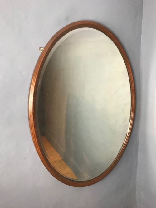 A Large Late Victorian Oak Oval Mirror Circa 1900