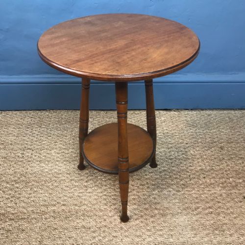 An Aesthetic Movement Walnut Circular 2 Tier Table Circa 1880 in the Style of E W Godwin