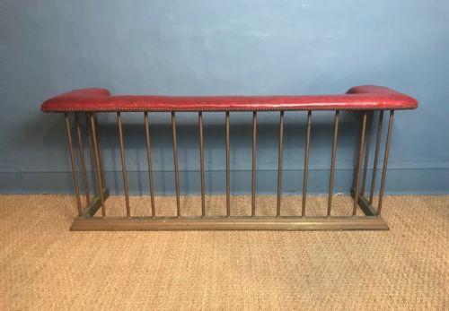 A Late Victorian Brass Club Fender C 1900 with Original Red Leather Top .