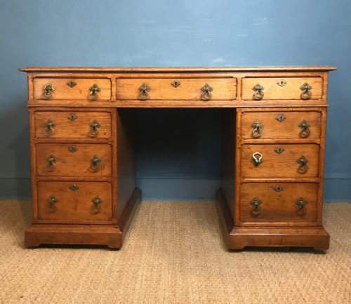 A Victorian Gothic Revival Oak Pedestal Desk Circa 1870