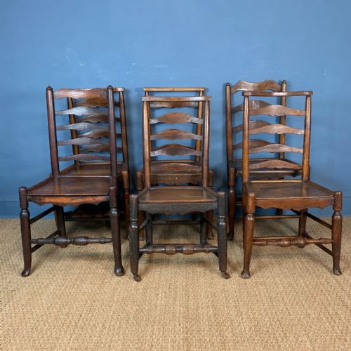 A Harlequin Set of 6 Late 18th Cheshire Cottage Ladder Back Chairs