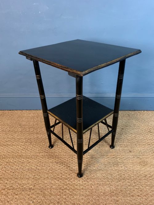 An E W Godwin  Aesthetic Movement Ebonised and Parcel Gilt Lamp Table C 1880