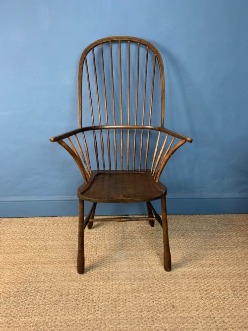 An Arts and Crafts Elm and Beech Windsor High Back Arm Chair in Shaker Style Circa 1900 .