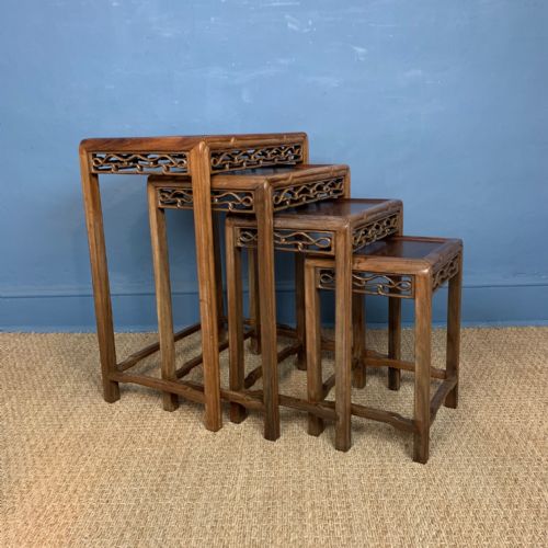 A Nest of 4 Chinese Carved Padoukwood Tables Circa 1890