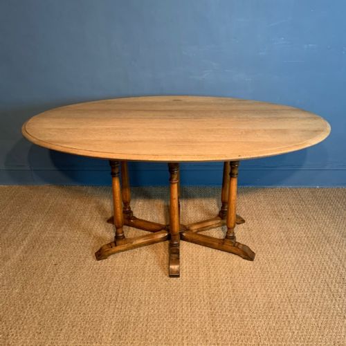 An Arts and Crafts Oak Oval Centre Table Circa 1900