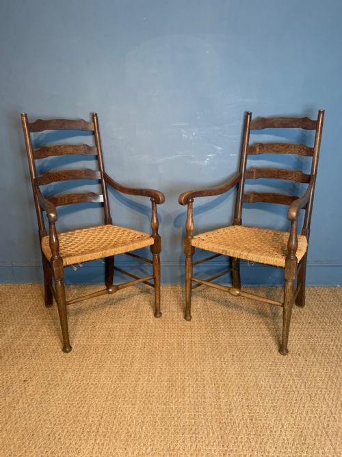 A Pair of Arts and Crafts Oak Elbow Chairs Circa 1900