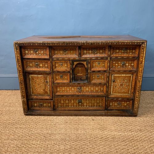 A Rare Early 17th Century Iberian Walnut and Bone Inlaid Table Cabinet Possibly Spanish Colonial Dated 1613.
