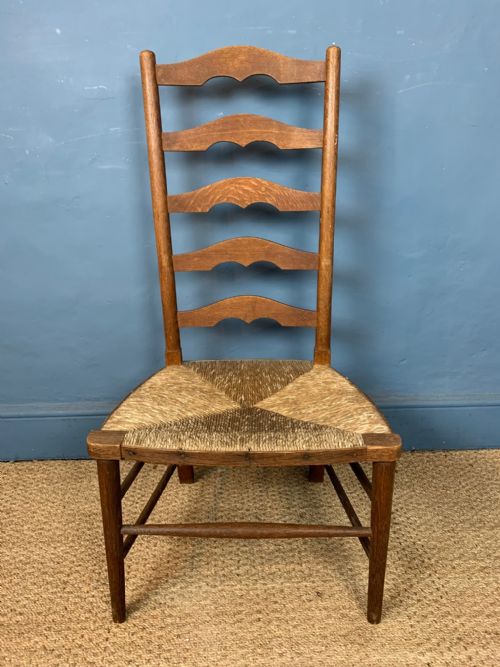 A HEALS OAK RUSH SEATED LADDER BACK CHAIR C 1930 - ADDITIONAL PHOTO 1