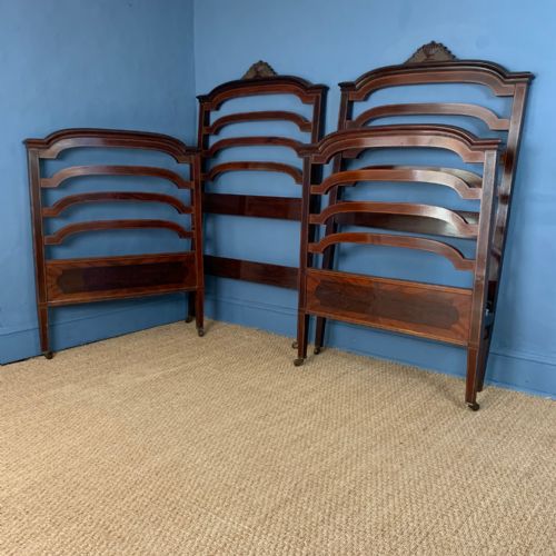 A Pair of Edwardian Mahogany and Boxwood Strung Single Beds Circa 1910.
