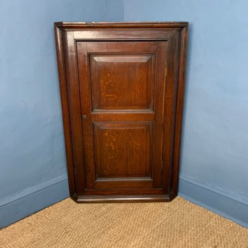 A Late Georgian Oak West Country Hanging  Corner Cupboard Circa 1820