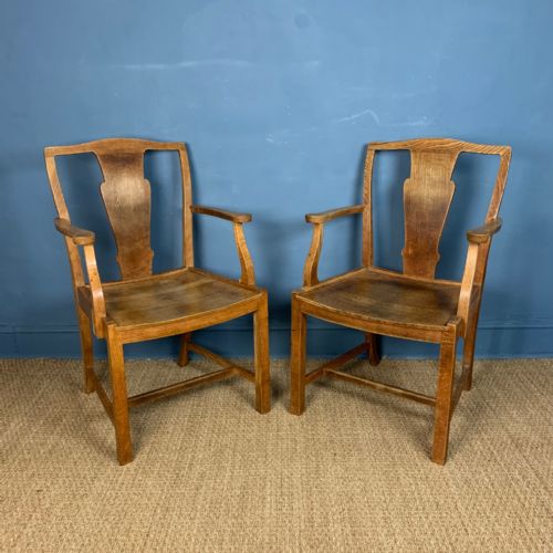 A Pair of Heals Oak Armchairs Circa 1930
