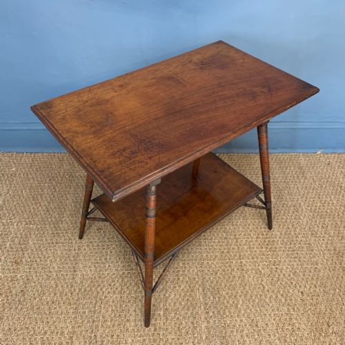 An Aesthetic Movement Walnut Rectangular Two Tier Table Circa 1880
