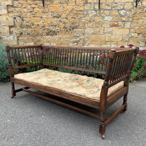 A Stylish Arts and Crafts Oak Bobbin Back Sofa Circa 1890