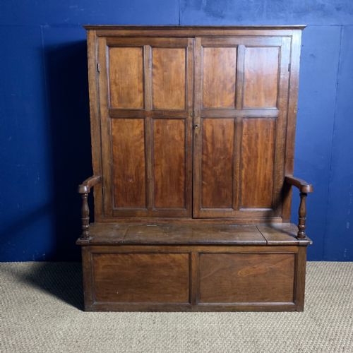 A Late Georgian Oak and Apple Bacon Settle Circa 1830