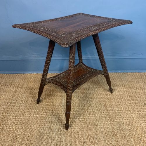 An Anglo Indian Carved Teak 2 Tier Occasional Table . Bombay Presidency Circa 1890