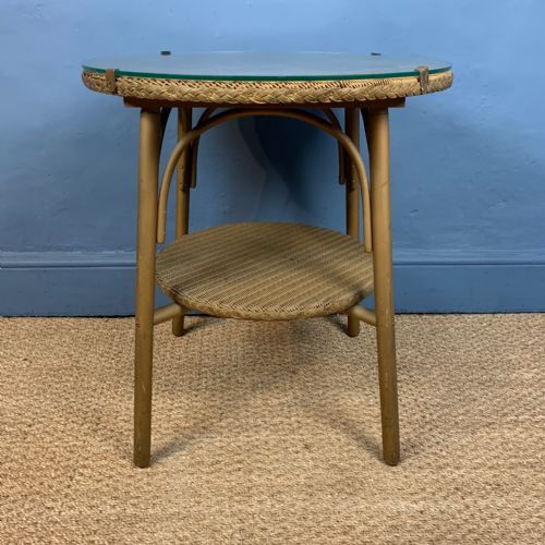 A 1930s Lloyd Loom 2 Tier Circular Conservatory Table with Original Glass Top.